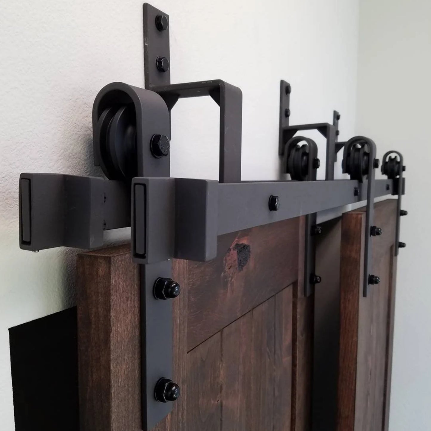 4-8.2FT black steel bypass barn door hardware one piece wall mount bypass sliding door track roller kit